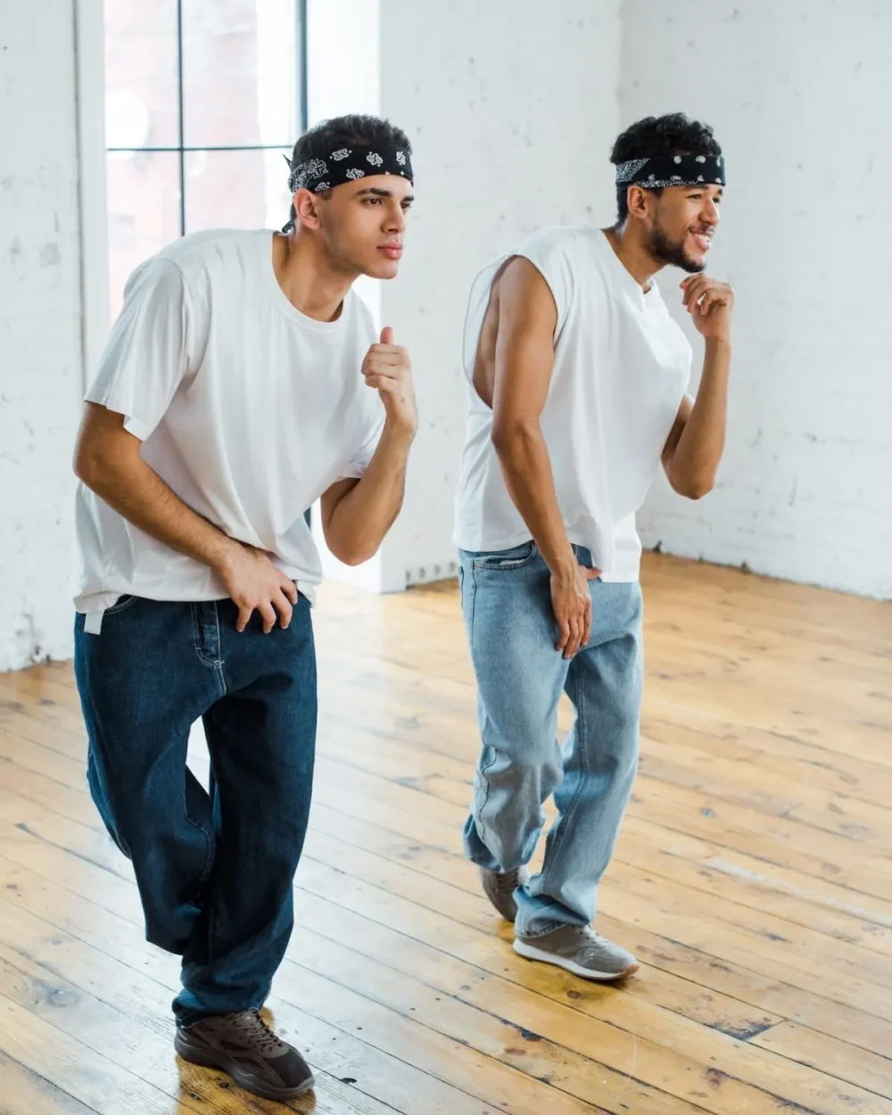 handsome-multicultural-dancers-in-headbands-dancing-hip-hop-e1684994207802.webp