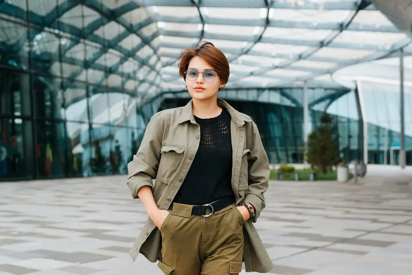 Stylish asian woman with short haircut wearing fashion glasses