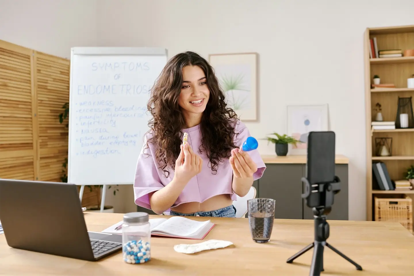 Influencer Comparing Menstrual Products At Studio