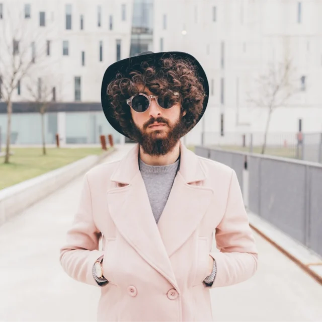 portrait-of-young-man-hands-in-pockets-in-urban-environment copy